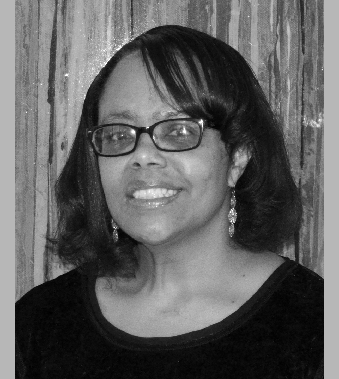 Portrait of Monica Moore, Pre-Collegiate Advisor | College Advisor